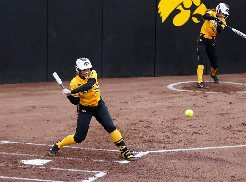 Iowa Hawkeyes catcher Angela Schmiederer (12) against UW Green Bay Tuesday, March 27, 2018 at Bob Pearl Field. (Brian Ray/hawkeyesports.com)