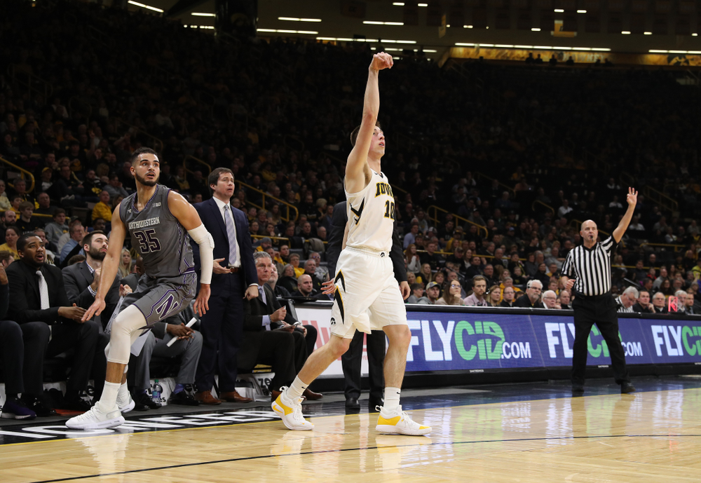 Iowa Hawkeyes guard Joe Wieskamp (10) knocks down a three point basket against the Northwestern Wildcats Sunday, February 10, 2019 at Carver-Hawkeye Arena. (Brian Ray/hawkeyesports.com)