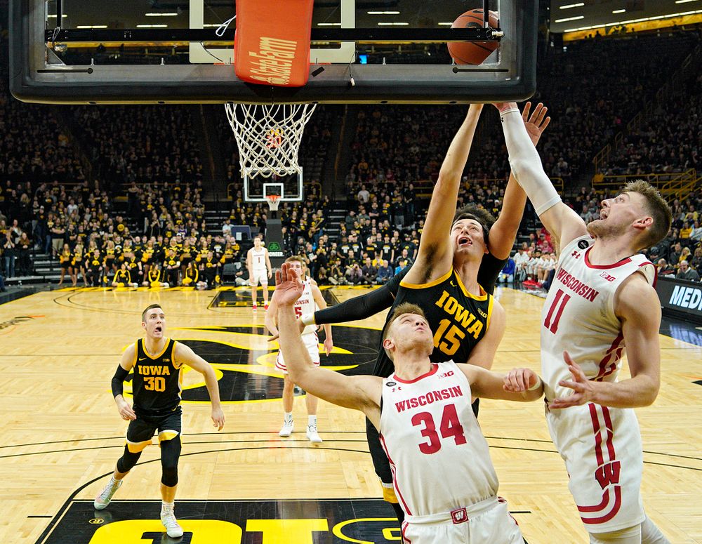 Iowa Hawkeyes forward Ryan Kriener (15) battles for a rebound during the first half of their game at Carver-Hawkeye Arena in Iowa City on Monday, January 27, 2020. (Stephen Mally/hawkeyesports.com)