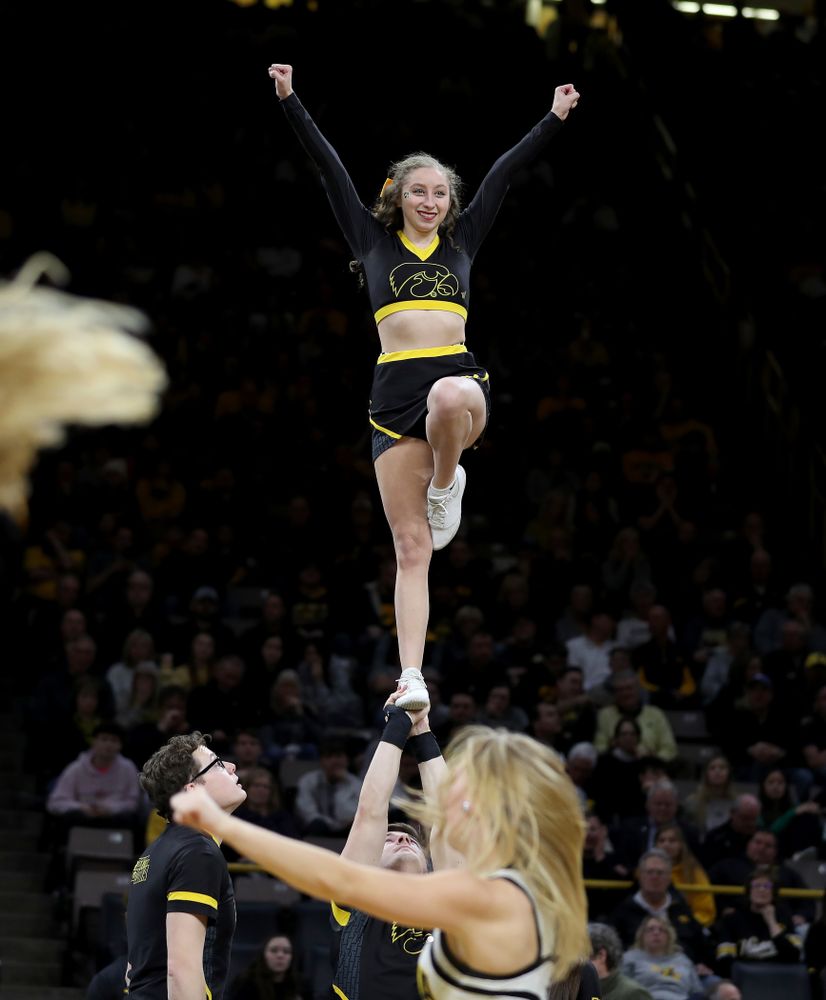 The Iowa Cheerleaders and Dance Team perform on senior night at half-time of the Iowa Hawkeyes game against the Purdue Boilermakers Tuesday, March 3, 2020 at Carver-Hawkeye Arena. (Brian Ray/hawkeyesports.com)