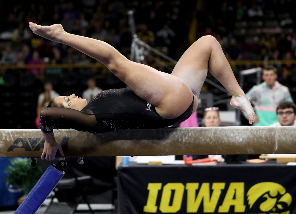 Iowa’s Dani Castillo competes on the beam against Michigan Friday, February 14, 2020 at Carver-Hawkeye Arena. (Brian Ray/hawkeyesports.com)