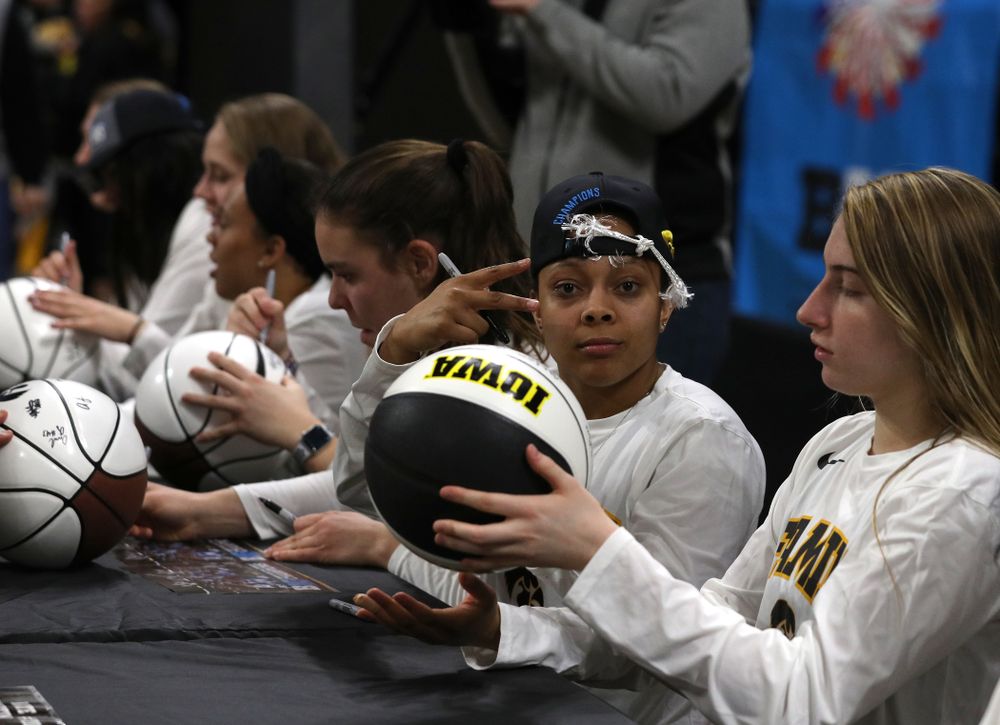 Iowa Hawkeyes guard Tania Davis (11) during a celebration of their Big Ten Women's Basketball Tournament championship Monday, March 18, 2019 at Carver-Hawkeye Arena. (Brian Ray/hawkeyesports.com)