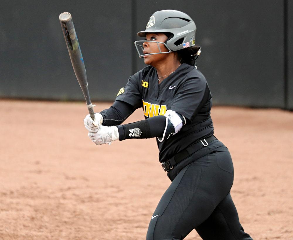 Iowa DoniRae Mayhew (24) hits a 2-run home run during the fourth inning of their game against Iowa Softball vs Indian Hills Community College at Pearl Field in Iowa City on Sunday, Oct 6, 2019. (Stephen Mally/hawkeyesports.com)