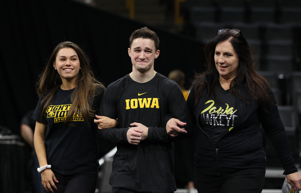 Iowa Men's Gymnast Jake Brodarzon and his family during senior day ceremonies following their meet against the Ohio State Buckeyes Saturday, March 16, 2019 at Carver-Hawkeye Arena. (Brian Ray/hawkeyesports.com)