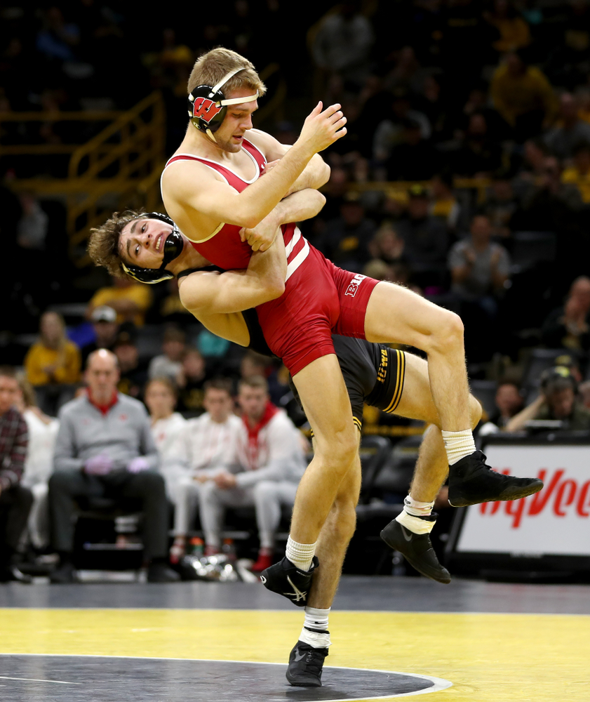 IowaÕs Austin DeSanto wrestles WisconsinÕs Seth Gross at 133 pounds Sunday, December 1, 2019 at Carver-Hawkeye Arena. DeSanto won the match 6-2. (Brian Ray/hawkeyesports.com)