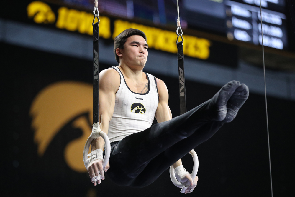 Iowa's Addison Chung competes on the rings against UIC and Minnesota Saturday, February 2, 2019 at Carver-Hawkeye Arena. (Brian Ray/hawkeyesports.com)