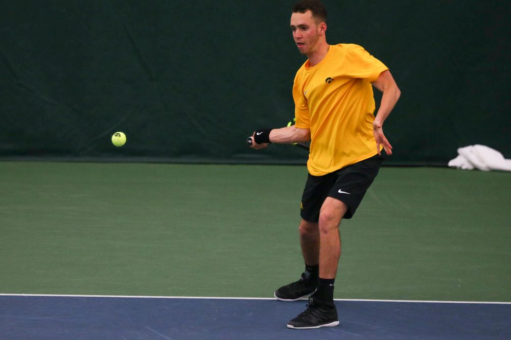 Iowa's Kareem Allaf at a tennis match vs Drake Friday, March 8, 2019 at the Hawkeye Tennis and Recreation Complex. (Lily Smith/hawkeyesports.com)