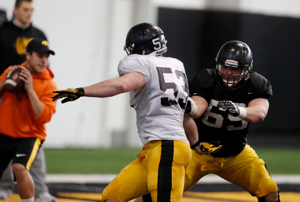 Iowa Hawkeyes defensive lineman Garret Jansen (53) and offensive lineman Keegan Render (69) Wednesday, April 4, 2018 at the Hansen Football Performance Center. (Brian Ray/hawkeyesports.com)