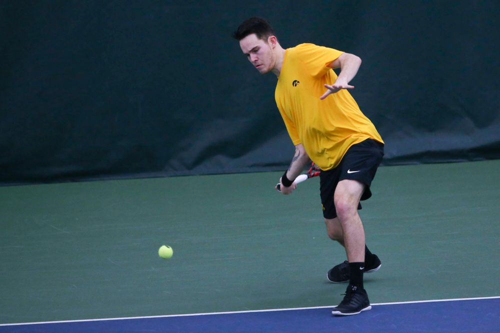 Iowa's Jonas Larsen at a tennis match vs Drake Friday, March 8, 2019 at the Hawkeye Tennis and Recreation Complex. (Lily Smith/hawkeyesports.com)