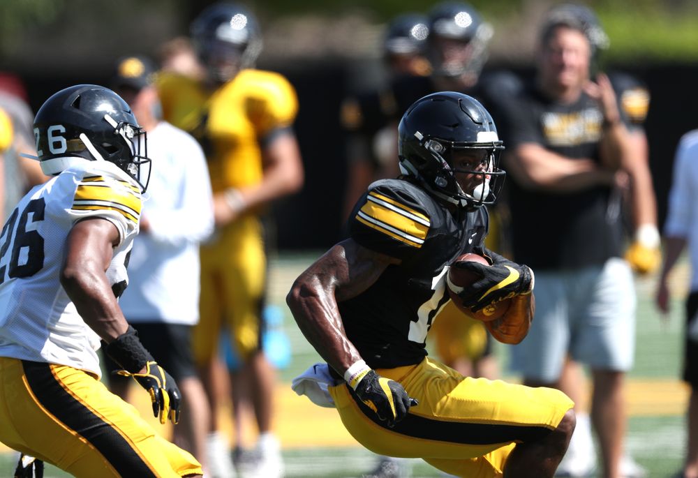 Iowa Hawkeyes wide receiver Brandon Smith (12) during Fall Camp Practice No. 5 Tuesday, August 6, 2019 at the Ronald D. and Margaret L. Kenyon Football Practice Facility. (Brian Ray/hawkeyesports.com)