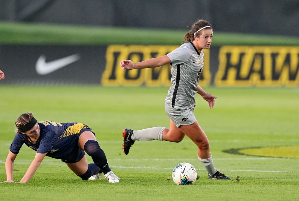 Iowa forward Kaleigh Haus (4) moves with the ball during the first half of their match at the Iowa Soccer Complex in Iowa City on Friday, Sep 13, 2019. (Stephen Mally/hawkeyesports.com)