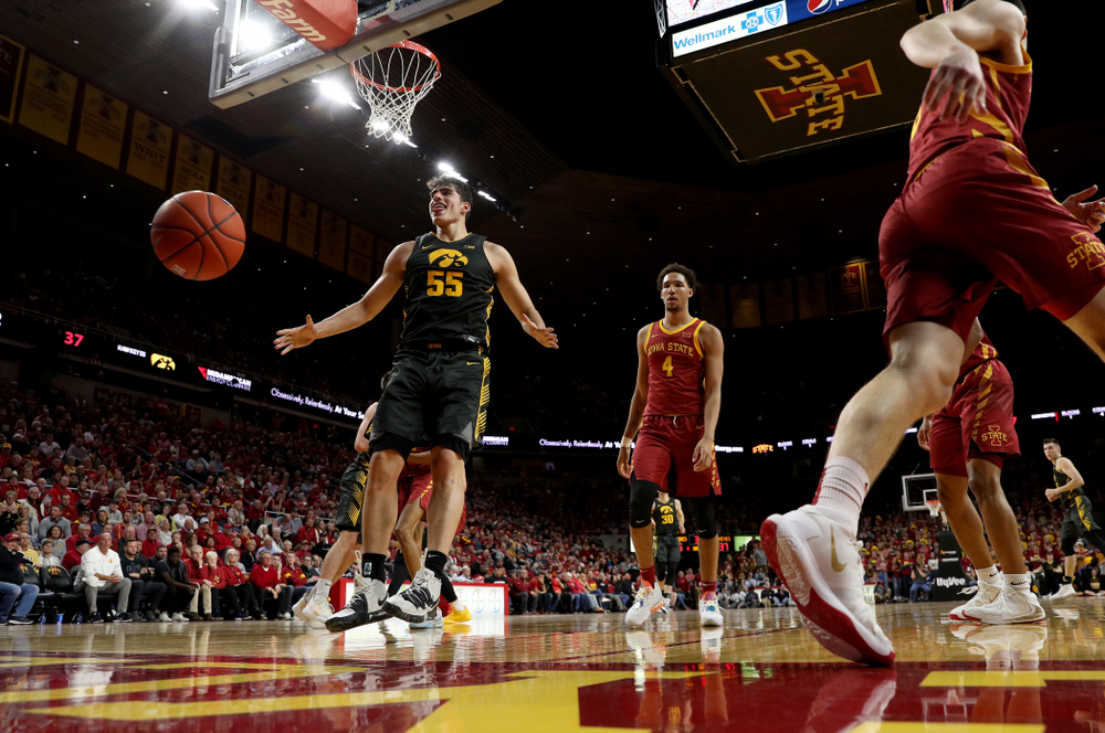Iowa Hawkeyes forward Luka Garza (55) celebrates after dunking the ball against the Iowa State Cyclones Thursday, December 12, 2019 at Hilton Coliseum in Ames, Iowa(Brian Ray/hawkeyesports.com)