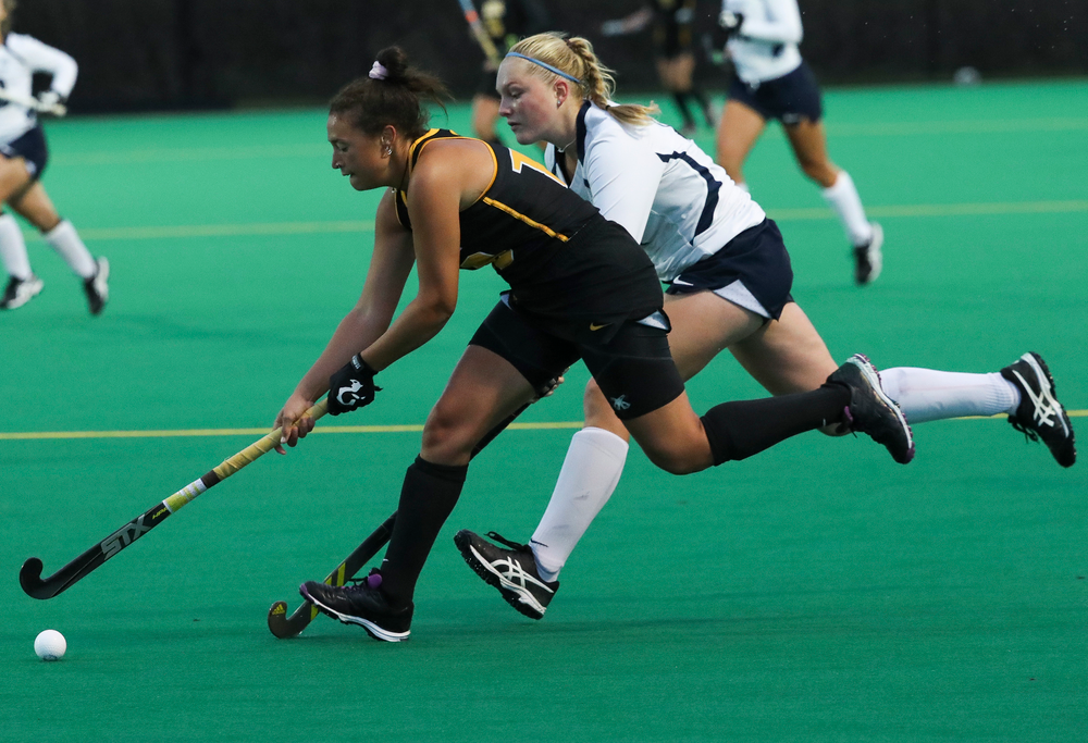 Iowa Hawkeyes forward Mya Christopher (18) dribbles the ball during a game against No. 6 Penn State at Grant Field on October 12, 2018. (Tork Mason/hawkeyesports.com)