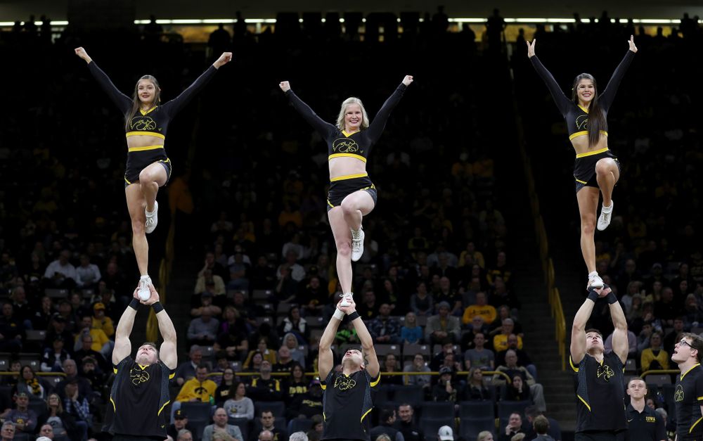 The Iowa Cheerleaders and Dance Team perform on senior night at half-time of the Iowa Hawkeyes game against the Purdue Boilermakers Tuesday, March 3, 2020 at Carver-Hawkeye Arena. (Brian Ray/hawkeyesports.com)