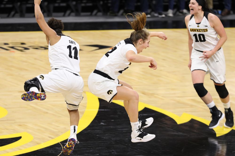 Iowa Hawkeyes guard Tania Davis (11) and guard Kathleen Doyle (22) against the Michigan Wolverines Thursday, January 17, 2019 at Carver-Hawkeye Arena. (Brian Ray/hawkeyesports.com)
