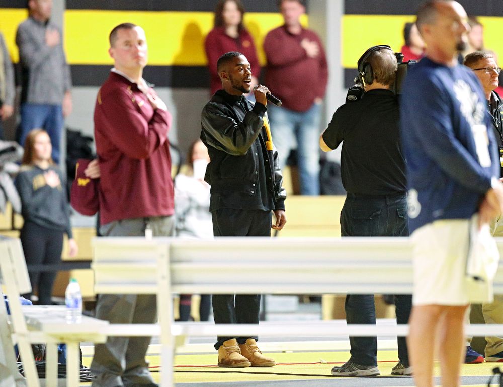 Iowa’s Antonio Woodard sings the National Anthem during the Larry Wieczorek Invitational at the Recreation Building in Iowa City on Friday, January 17, 2020. (Stephen Mally/hawkeyesports.com)