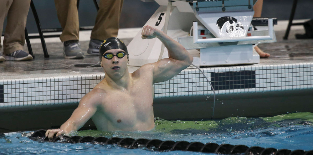 Iowa’s Aleksey Tarasenko flexes after swimming the 200-yard freestyle during the Iowa swimming and diving meet vs Notre Dame and Illinois on Saturday, January 11, 2020 at the Campus Recreation and Wellness Center. (Lily Smith/hawkeyesports.com)