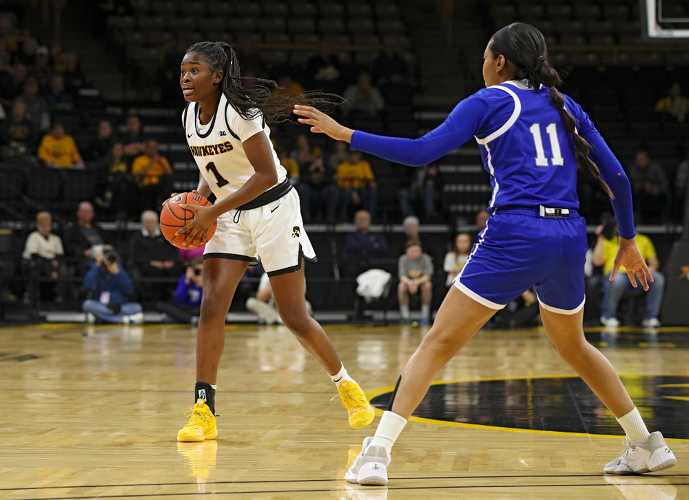 Iowa Hawkeyes guard Tomi Taiwo (1) looks to pass during the first quarter of their game at Carver-Hawkeye Arena in Iowa City on Saturday, December 21, 2019. (Stephen Mally/hawkeyesports.com)