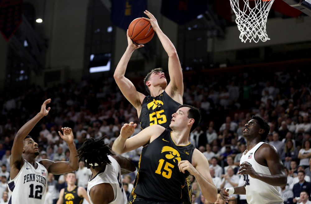 Iowa Hawkeyes forward Luka Garza (55) grabs a rebound against Penn State Saturday, January 4, 2020 at the Palestra in Philadelphia. (Brian Ray/hawkeyesports.com)