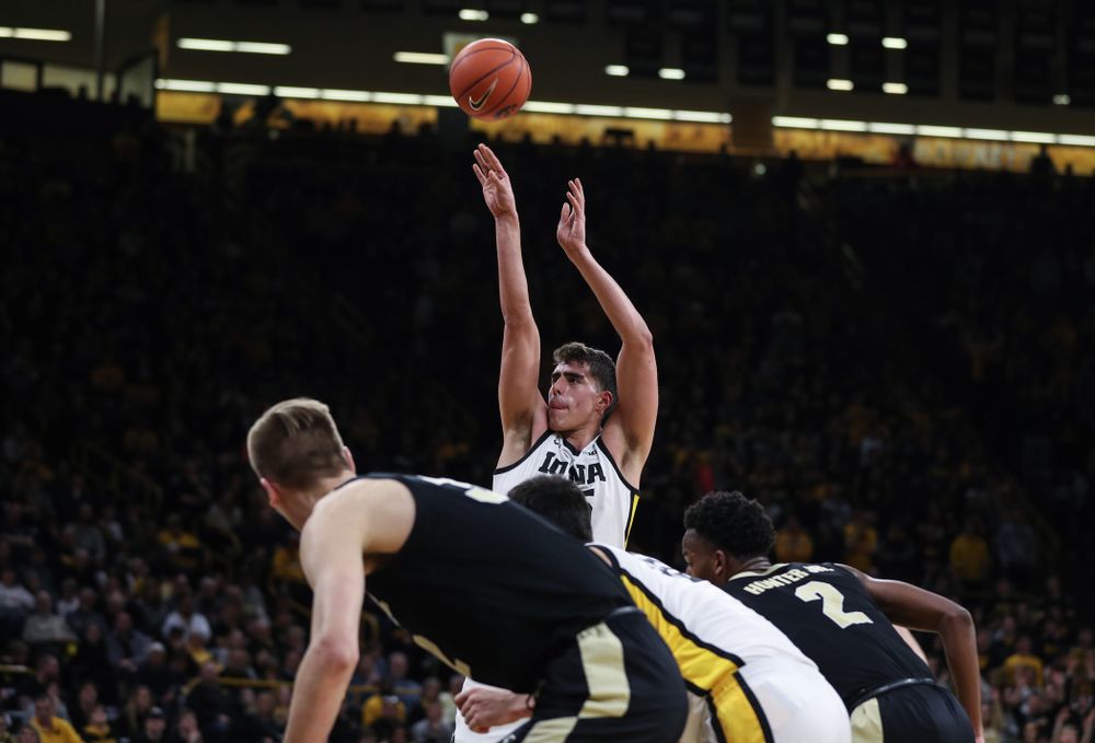 Iowa Hawkeyes forward Luka Garza (55) sets the school record for most points in a season against the Purdue Boilermakers Tuesday, March 3, 2020 at Carver-Hawkeye Arena. (Brian Ray/hawkeyesports.com)