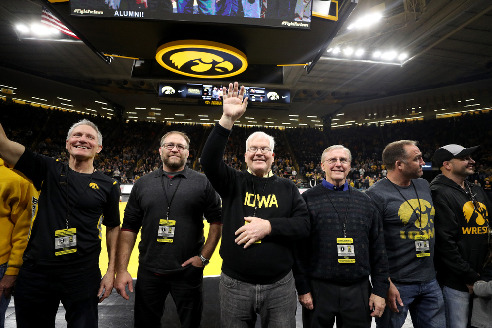Legendary former head coach Dan Gable shakes hands with Iowa Wrestling alumni during the Iowa Hawkeyes dual against Oklahoma State Sunday, February 23, 2020 at Carver-Hawkeye Arena. (Brian Ray/hawkeyesports.com)