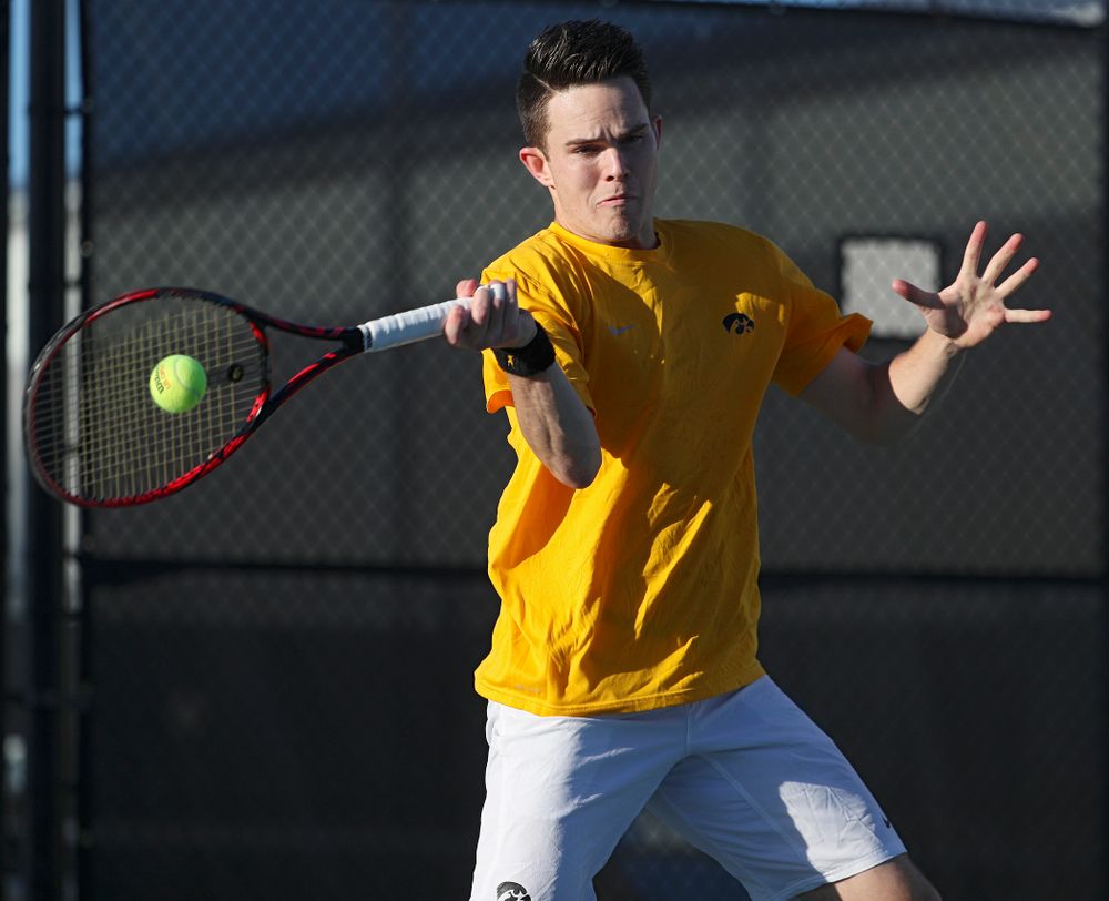 Iowa's Jonas Larsen during their doubles match again Michigan State at the Hawkeye Tennis and Recreation Complex in Iowa City on Friday, Apr. 19, 2019. (Stephen Mally/hawkeyesports.com)
