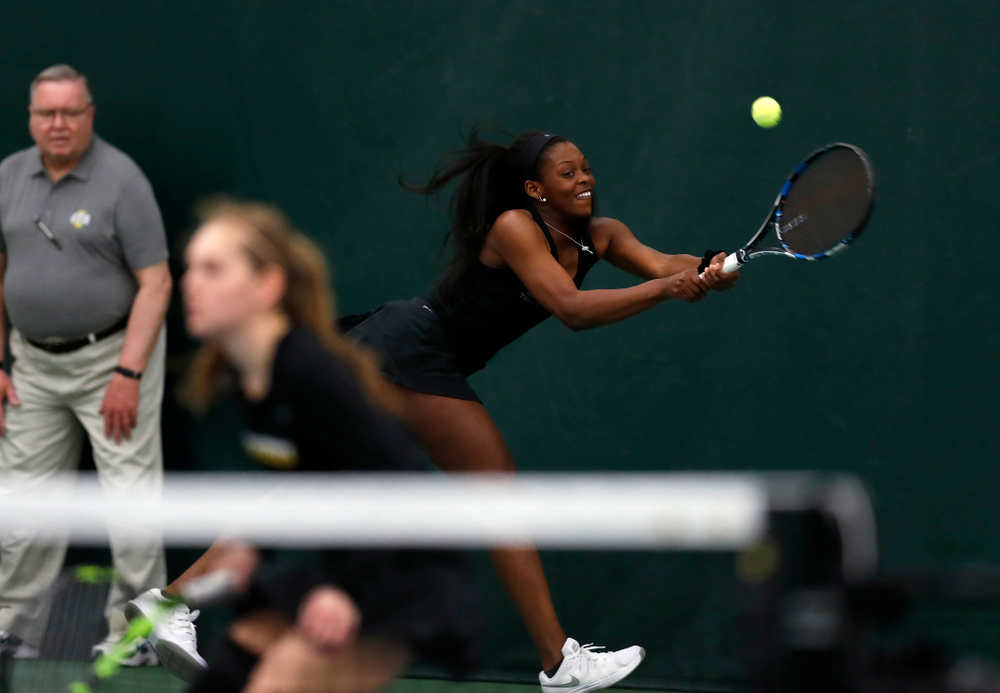 Adorable Huckleby and Zoe Douglas play a doubles match against Ohio State Sunday, March 25, 2018 at the Hawkeye Tennis and Recreation Center. (Brian Ray/hawkeyesports.com)