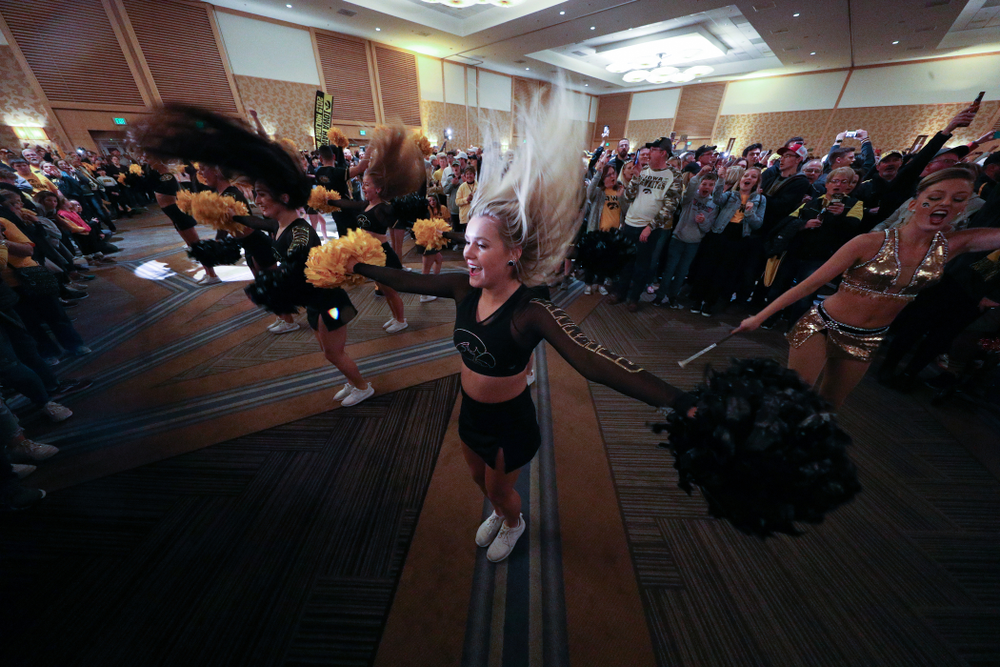 The Hawkeye Marching Band and the Iowa Spirit Squads perform during the Holiday Bowl Hawkeye Huddle Thursday, December 26, 2019 at the Hilton in downtown San Diego. (Brian Ray/hawkeyesports.com)