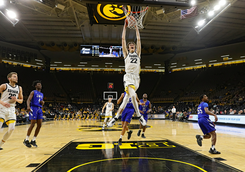 Iowa Hawkeyes forward Patrick McCaffery (22) dunks the ball during the second half of their exhibition game against Lindsey Wilson College at Carver-Hawkeye Arena in Iowa City on Monday, Nov 4, 2019. (Stephen Mally/hawkeyesports.com)