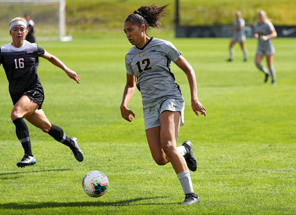 Iowa forward Olivia Fiegel (12) moves with the ball during the first half of their match at the Iowa Soccer Complex in Iowa City on Sunday, Sep 1, 2019. (Stephen Mally/hawkeyesports.com)