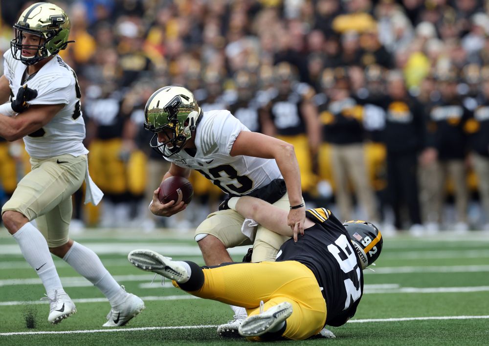 Iowa Hawkeyes defensive lineman John Waggoner (92) sacks Purdue Boilermakers quarterback Jack Plummer Saturday, October 19, 2019 at Kinnick Stadium. (Brian Ray/hawkeyesports.com)