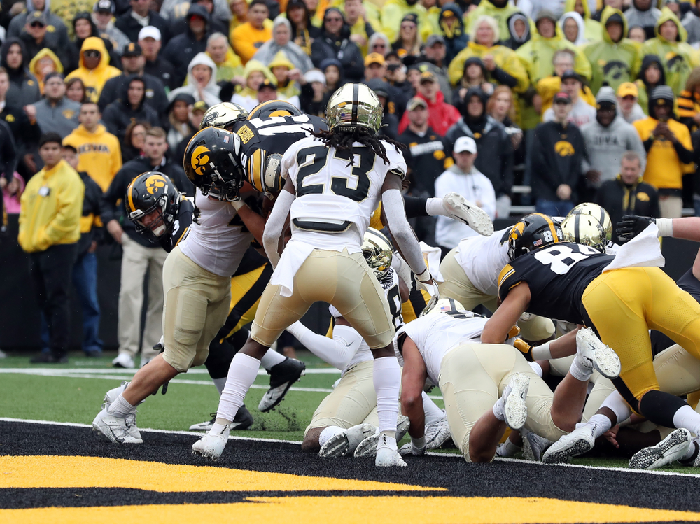 Iowa Hawkeyes running back Tyler Goodson (15) scores his first career touchdown against the Purdue Boilermakers Saturday, October 19, 2019 at Kinnick Stadium. (Brian Ray/hawkeyesports.com)
