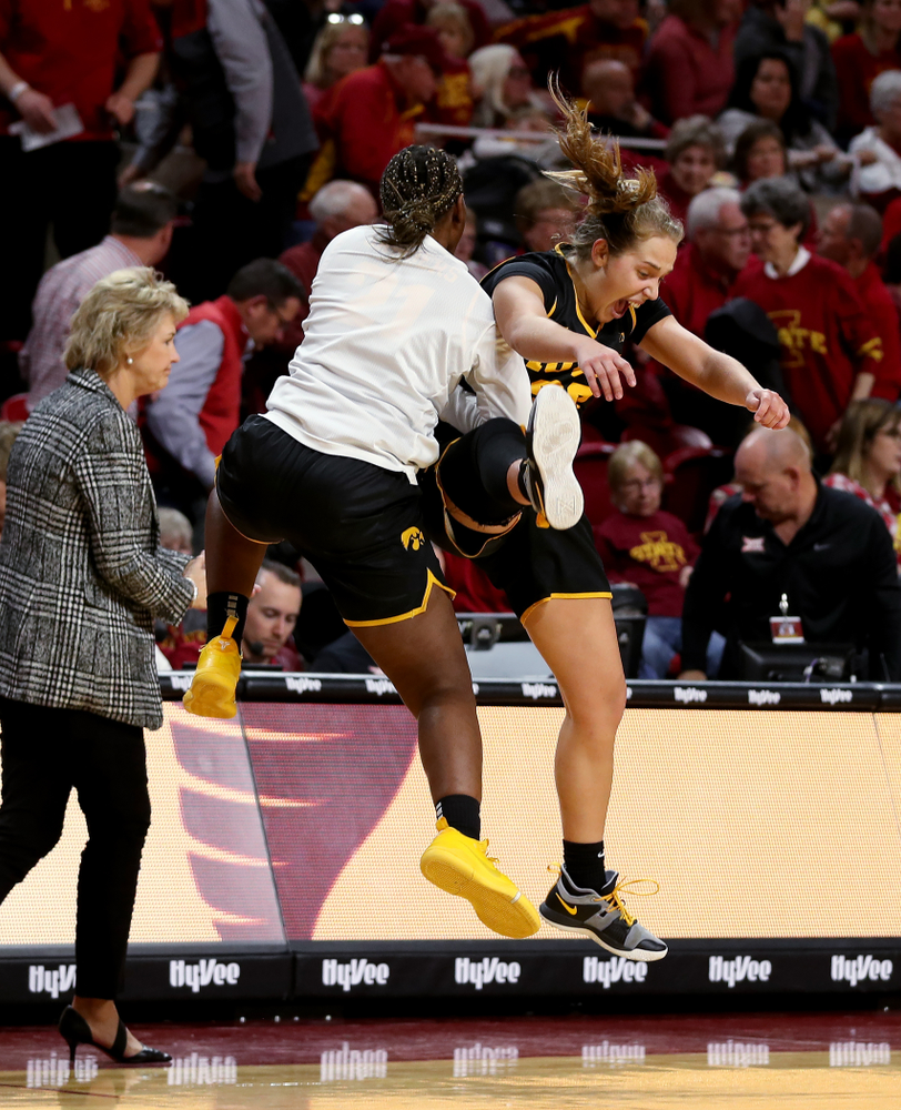 Iowa Hawkeyes guard Kathleen Doyle (22) and guard Zion Sanders (21) against the Iowa State Cyclones Wednesday, December 11, 2019 at Hilton Coliseum in Ames, Iowa(Brian Ray/hawkeyesports.com)