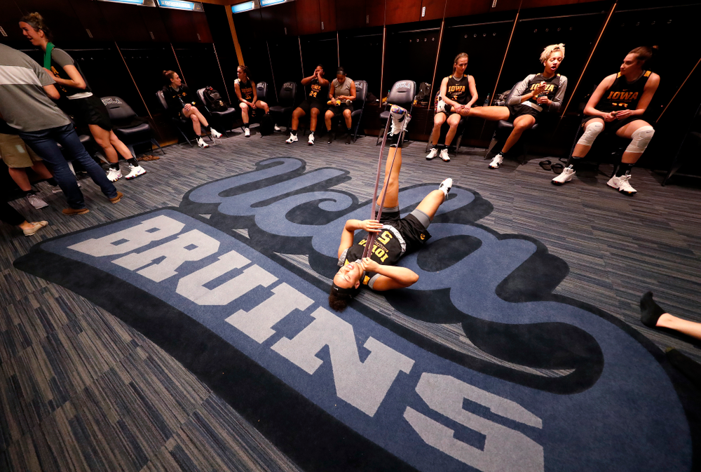 Iowa Hawkeyes guard Alexis Sevillian (5) stretches before practice Friday, March 16, 2018 at Pauley Pavilion on the campus of UCLA. (Brian Ray/hawkeyesports.com)