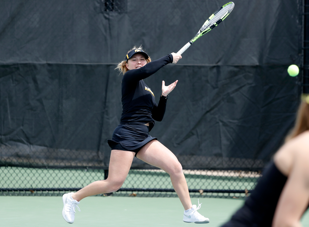 Montana Crawford and Danielle Burich play a doubles match against the Wisconsin Badgers Sunday, April 22, 2018 at the Hawkeye Tennis and Recreation Center. (Brian Ray/hawkeyesports.com)
