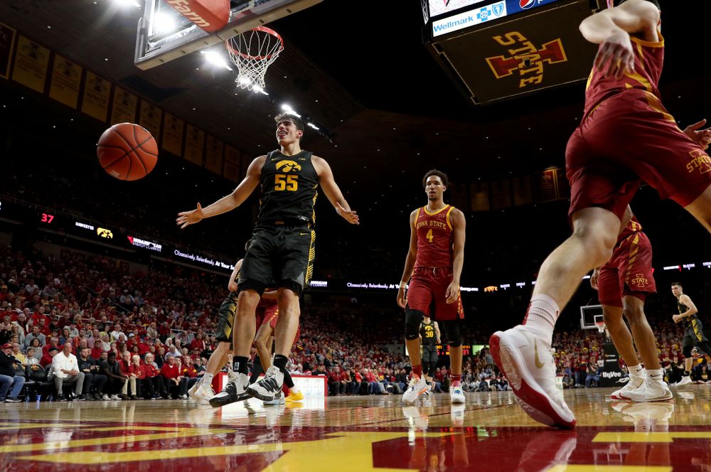 Iowa Hawkeyes forward Luka Garza (55) celebrates after dunking the ball against the Iowa State Cyclones Thursday, December 12, 2019 at Hilton Coliseum in Ames, Iowa(Brian Ray/hawkeyesports.com)