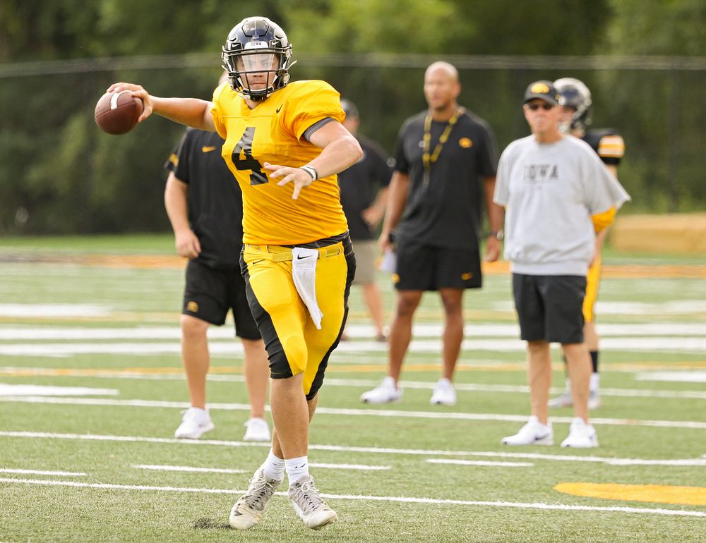 Iowa Hawkeyes quarterback Nate Stanley (4) throws on the run during Fall Camp Practice No. 10 at the Hansen Football Performance Center in Iowa City on Tuesday, Aug 13, 2019. (Stephen Mally/hawkeyesports.com)