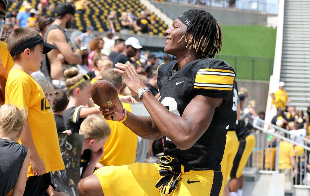 Iowa Hawkeyes wide receiver Brandon Smith (12) during Kids Day Saturday, August 11, 2018 at Kinnick Stadium. (Brian Ray/hawkeyesports.com)