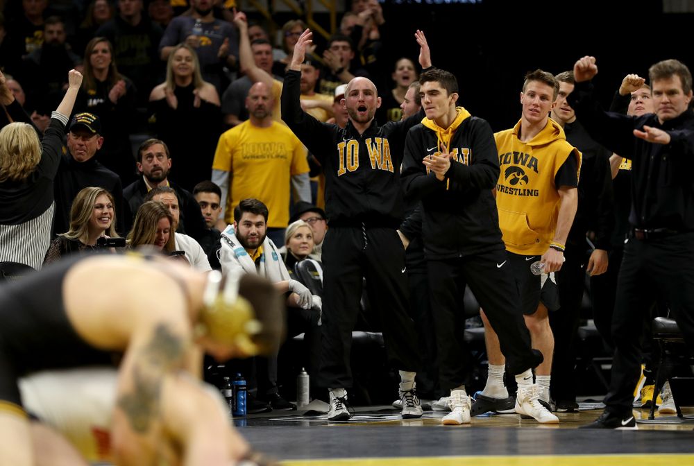 Alex Marinelli cheers as Iowa’s Abe Assad wrestles Ohio State’s Rockey Jordan at 184 pounds Friday, January 24, 2020 at Carver-Hawkeye Arena. Assad won the match 3-1. (Brian Ray/hawkeyesports.com)