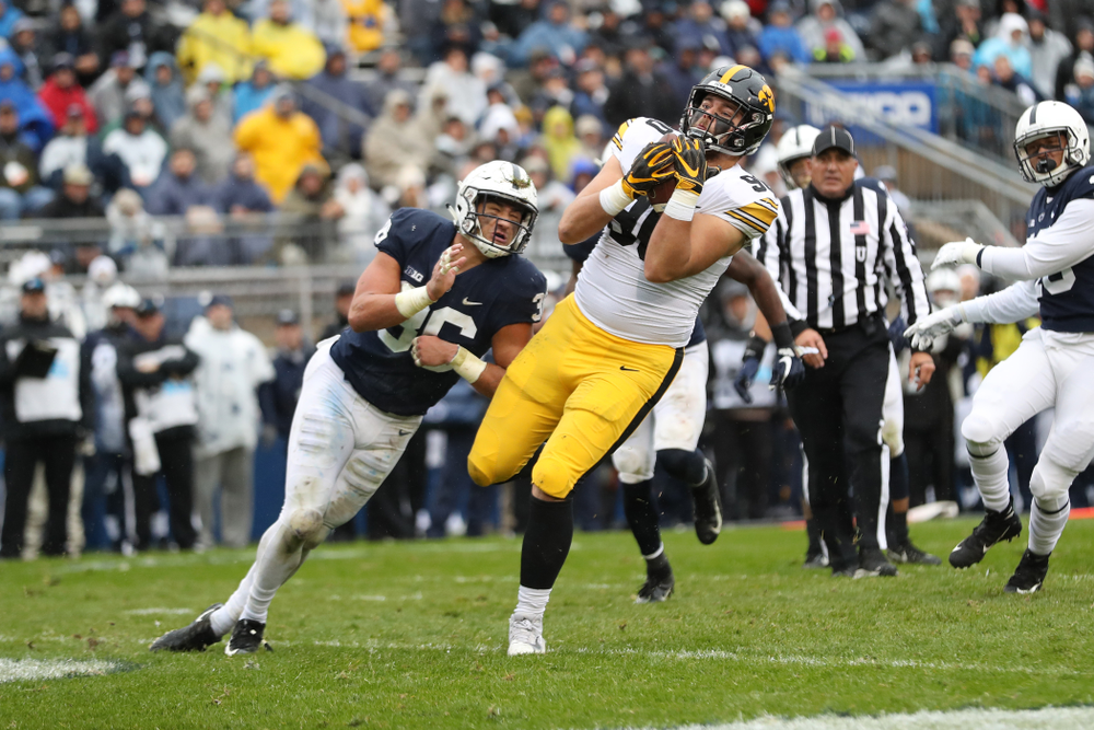 Iowa Hawkeyes defensive end Sam Brincks (90) catches a touchdown pass against the Penn State Nittany Lions Saturday, October 27, 2018 at Beaver Stadium in University Park, Pa. (Max Allen/hawkeyesports.com)