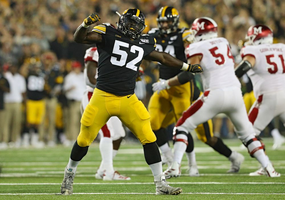 Iowa Hawkeyes linebacker Amani Jones (52) celebrates after sacking Miami (Oh) Redhawks quarterback Brett Gabbert (5) during the third quarter of their game at Kinnick Stadium in Iowa City on Saturday, Aug 31, 2019. (Stephen Mally/hawkeyesports.com)