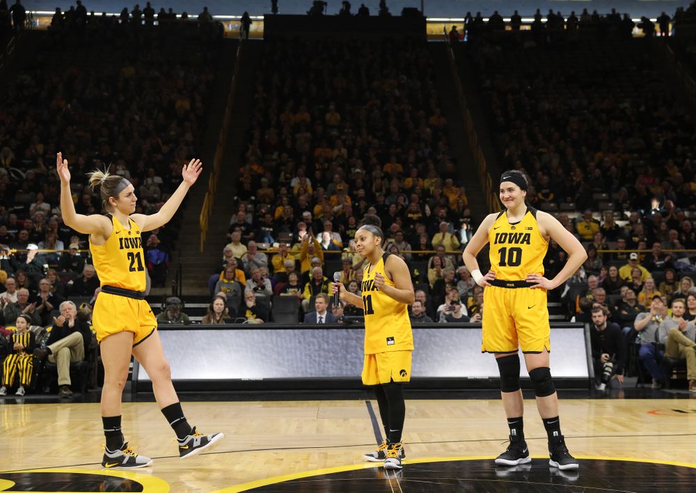 Iowa Hawkeyes forward Megan Gustafson (10), guard Tania Davis (11), and forward Hannah Stewart (21) during senior day ceremonies following their game against the Northwestern Wildcats Sunday, March 3, 2019 at Carver-Hawkeye Arena. (Brian Ray/hawkeyesports.com)