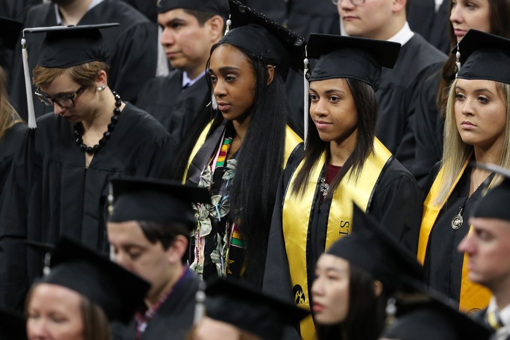 Iowa Track's Alexis Gay and Briana Guillory during the Fall Commencement Ceremony Saturday, December 15, 2018 at Carver-Hawkeye Arena. (Brian Ray/hawkeyesports.com)