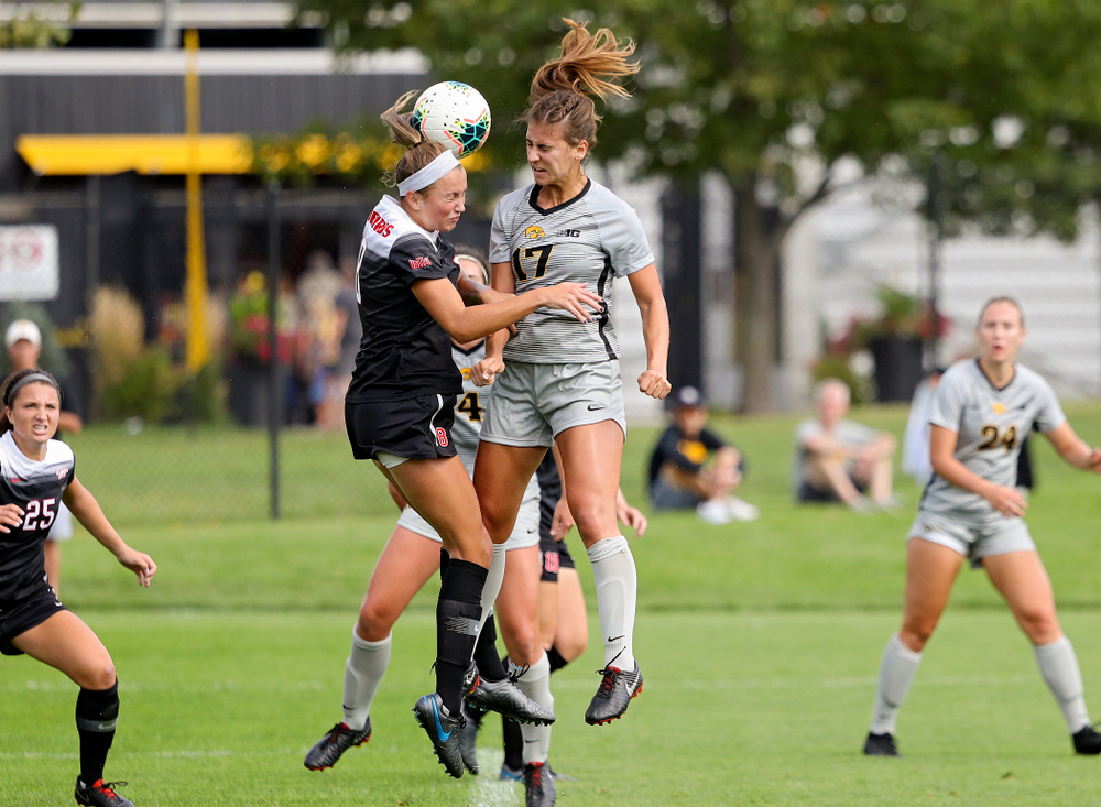 Iowa defender Hannah Drkulec (17) battles for a header on a corner kick during the first half of their match at the Iowa Soccer Complex in Iowa City on Sunday, Sep 1, 2019. (Stephen Mally/hawkeyesports.com)