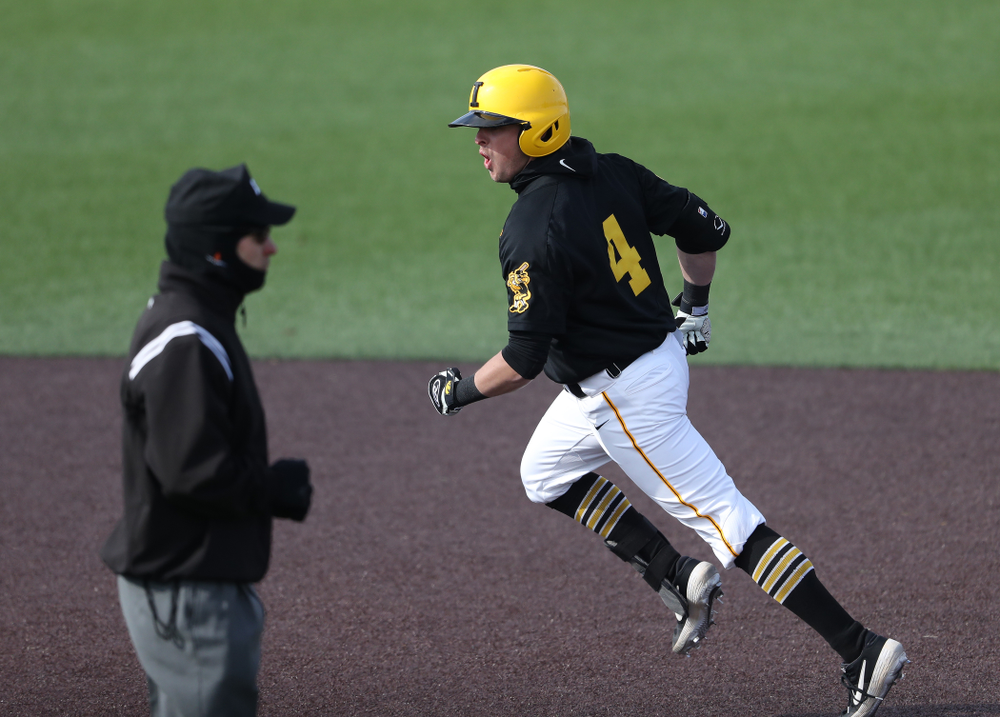 Iowa Hawkeyes infielder Mitchell Boe (4) reacts after hitting a game tying three-run homer against California State Northridge Sunday, March 17, 2019 at Duane Banks Field. (Brian Ray/hawkeyesports.com)