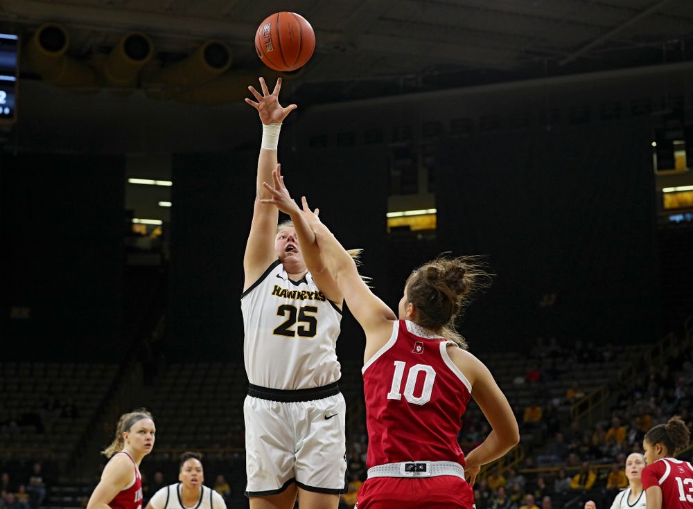 Iowa Hawkeyes forward Monika Czinano (25) scores a basket during the first quarter of their game at Carver-Hawkeye Arena in Iowa City on Sunday, January 12, 2020. (Stephen Mally/hawkeyesports.com)