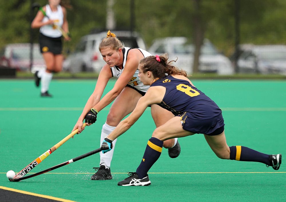 Iowa’s Ellie Holley (7) reaches for the ball during the first quarter of their game at Grant Field in Iowa City on Friday, Sep 13, 2019. (Stephen Mally/hawkeyesports.com)
