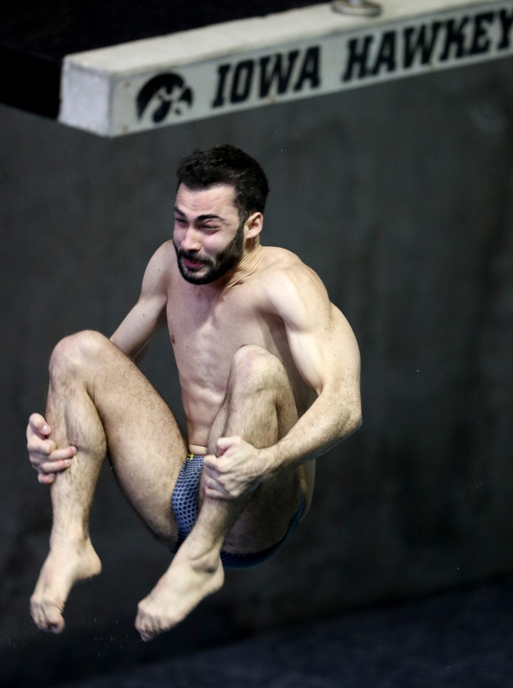 IowaÕs Mohamed Neuman competes on the 1 meter springboard against Notre Dame and Illinois Saturday, January 11, 2020 at the Campus Recreation and Wellness Center. (Brian Ray/hawkeyesports.com)