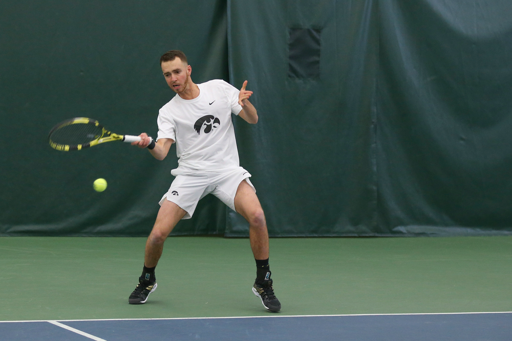 Iowa’s Kareem Allaf returns a hit during the Iowa men’s tennis meet vs Nebraska on Sunday, March 1, 2020 at the Hawkeye Tennis and Recreation Complex. (Lily Smith/hawkeyesports.com)