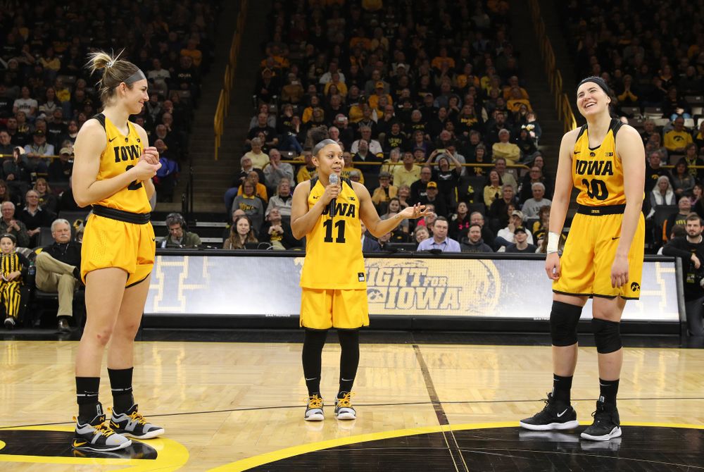 Iowa Hawkeyes forward Megan Gustafson (10), guard Tania Davis (11), and forward Hannah Stewart (21) during senior day ceremonies following their game against the Northwestern Wildcats Sunday, March 3, 2019 at Carver-Hawkeye Arena. (Brian Ray/hawkeyesports.com)